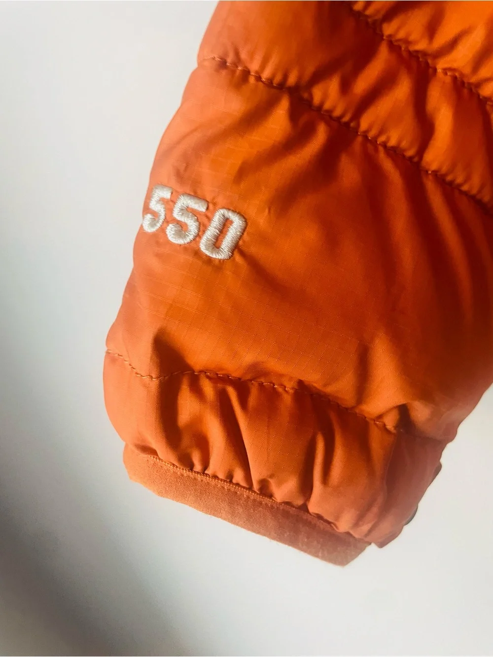 The North Face 550 Orange Rust Puffer Jacket
